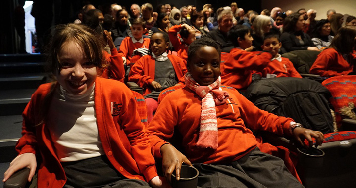 Children at the London Transport Museum waiting to present their oral history project to an audience for the first time.